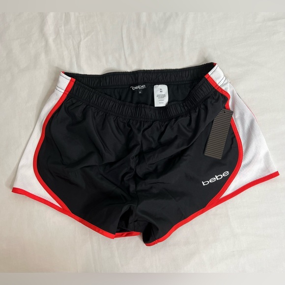 Women's BeBe athletic shorts size XL. Black White with Red stripes. - Picture 1 of 4